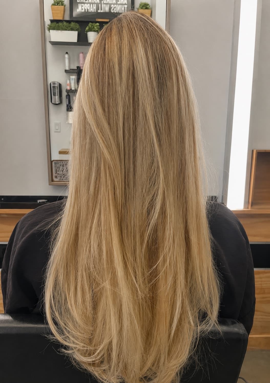 Long dimensional blonde highlights with layered ends, finished in the chair at McAllister Spa in Miami Beach